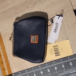 Dooney&Bourke Wallet with snap top.